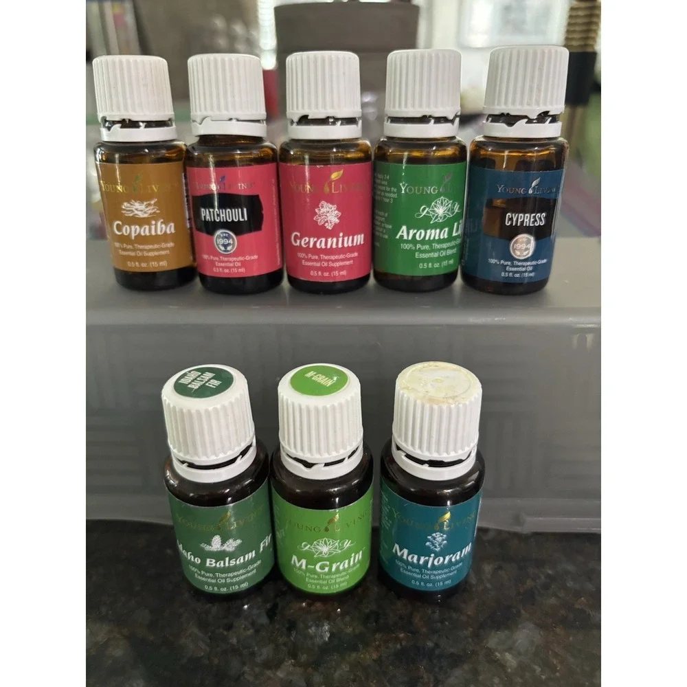 young living essential oils Lot Of 8 -15ml  Including M-Grain, Idaho Fir Opened